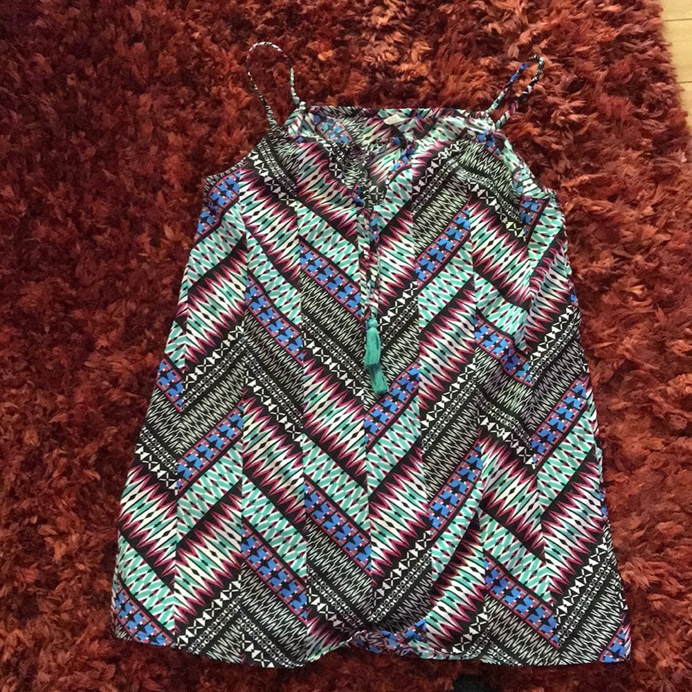 Lightweight sheer blouse with tassels
